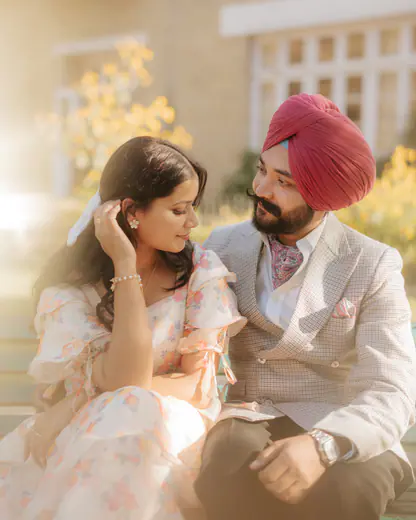 Sikh couple sharing a quiet moment in golden evening light during their pre-wedding shoot